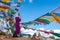 The Beautiful Scenery: Woman and Prayer Flags