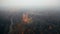 Beautiful scenic aerial panorama of ancient Turaida castle museum in Sigulda, Latvia, autumn foggy forest and highway.