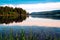 Beautiful scenic afternoon view of a quiet lake and rural mountains from Valdres, Norway