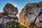 Beautiful scenic autumn landscape of mountain rocks under blue sky at sunset. Stone nature rocky background, Caucasus, Russia