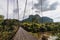 Beautiful scenic of `Khao Phang` suspension bridge with heart liked mountain in behind