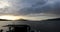 Beautiful scenic landscape of amazing Scotland sun set sky from moving boat. 4K Footage.