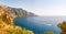Beautiful scenic landscape of Positano. Rocky coastline full of boats and yachts traveling near high mountains. Cityscape of