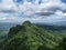 Beautiful scenic view of green jungle peak with amazing cloudy blue sky