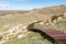 Beautiful scenic view of the rusty steel boardwalk connecting the summit of Mount Kosciuszko 2228m above sea level