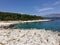 A beautiful scenic view of the turquoise colour water of a remote beach on Korcula island in Croatia.