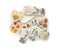 Beautiful scented sachets with flowers on white background, top view