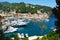 Beautiful sea coast with colorful houses of Portofino. Summer sight of typical italian landscape. Portofino, Ligurian Riviera
