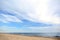 Beautiful sea coast with seagulls under blue sky