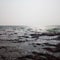 Beautiful sea and dangerous sharp sea rocks image in sunset india