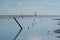 Beautiful sea landscape with silhouette Great Egret Ardea alba and Little Egret Egretta garzetta stand on low tide ocean sea b
