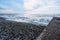 Beautiful sea landscape. Strong powerful sea waves break on shingle sea shore. Dangerous power of element of water