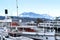 Beautiful sea, river landscape with boats, pier in Lucerne, Switzerland, white expensive yachts on lake, snow-covered mountains in