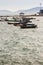 Beautiful sea, sand and fishing boats with mountain and blue sky