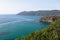 Beautiful sea view or the emerald sea of the island of Elba in Tuscany with a speedboat crossing the horizon. Elba island, Tuscany
