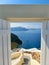 Beautiful sea view from the open gate. Santorini island, Greece.