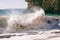 Beautiful sea view with secret sandy beach among rocks and cliff