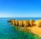 Beautiful sea view with secret sandy beach among rocks and cliffs near Albufeira in Algarve, Portugal