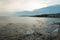 Beautiful sea view with waves with rocks in the evening at sunset near the city of Malaga. Spain. Seascape.