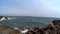 Beautiful sea waves rocky point Spain. Ocean beach, cliff and beautiful scenery along coast