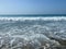 Beautiful sea with waves splashing water landscape view from the beach in a warm tropical eastern country southern resort.