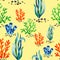 Beautiful seamless marine pattern with corals and seaweed plants on yellow. Hand drawn with acrylic paint