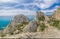 Beautiful seascape, panorama of cape Kapchik to the Galitsin Trail and blue bay of the Black Sea. Sudak, New World. Landscape of