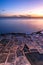 Beautiful seascape at sunrise, Marsaskala salt pans in Malta