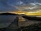 Beautiful seascape view with wooden jetty during sunset at Kota Belud beach,Sabah.