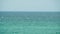 Beautiful seascape, water with small waves, endless horizon, and clear, blue sky. Shot. Turquoise water with small