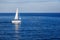 Beautiful seascape, white sailboat in the blue sea, romance of t