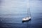 Beautiful seascape, white sailboat in the blue sea, romance of t