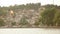 Beautiful seaside view of Ohrid town and huge Macedonian flag waving from the Ohrid lake. Ohrid is fa