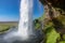 Beautiful Seljalandsfoss waterfall in Iceland, icelandic summer nature and river