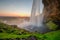 Beautiful Seljalandsfoss waterfall in Iceland during Sunset.