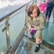 Beautiful Senior asian women stand on Tianmen mountain Glass balcony with winning Pose and beautfiul View on the mountain at zhang