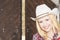 Beautiful Sensual Smiling Happy Blond Cowgirl wearing Stetson