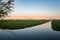 Beautiful serene calm water in dutch polder landscape