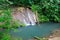 Beautiful serene waterfall among southern forests