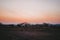 Beautiful setting sun over a field on a Kenyan safari