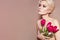 Beautiful sexy Blonde Woman with luxury Make-up. Girl with Spring Flowers Bouquet. Style for Womans Day or Valentines