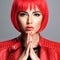 Beautiful sexy woman with bright red bob hairstyle. Fashion  model. Sensual  gorgeous girl in a leather jacket. Stunning face of a