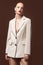 Beautiful sexy woman wear for meeting date business style suit jacket pants accessory fashion collection shoes model pose long