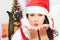 Beautiful and sexy woman wearing santa clause costume and waiting for a New Year