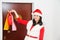 Beautiful and sexy woman wearing santa clause costume and waiting for a New Year