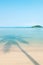 Beautiful shadow of palm tree on the blue sea in summer. Relaxation tropical seascape. Sunshine day. Koh Mak Island, Trat,