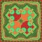 Beautiful shawl in ethnic style with mandalas flowers and paisley ornament in red, green and orange colors