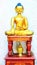 Beautiful shining classical Buddha Shakyamuni Siddhartha Gautama golden statue with open eyes  on the white