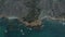 Beautiful Shoreline of Mediterranean Island with Blue Ocean Waves crashing on Rocks, Aerial Birds Eye Tilt Down View