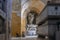 Beautiful shot of an arched interior with statues in an old fortress